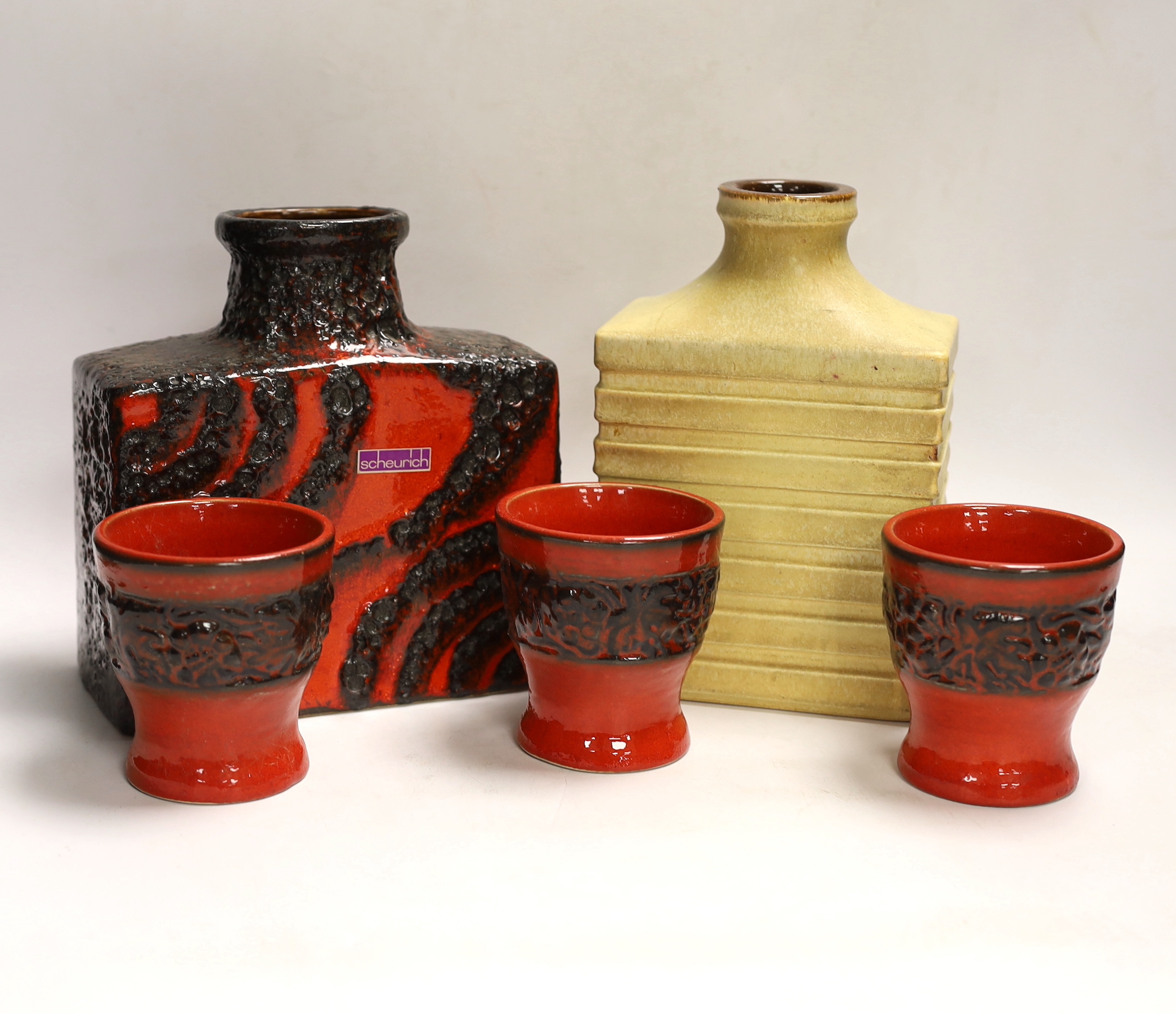 Five West German pottery items including a Scheurich vase, a Carstens vase and three beakers, tallest 20cm